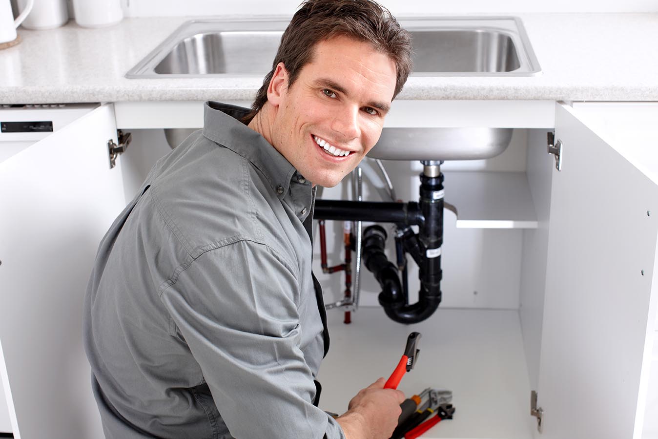 plumber smiling at work