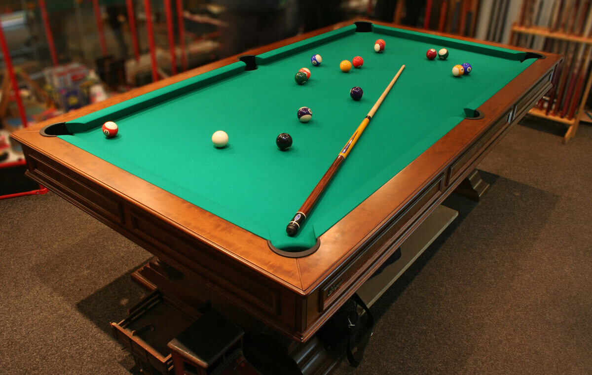 Why Hire Professional Pool Table Removal Services